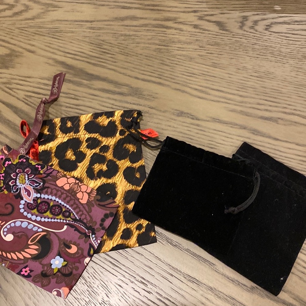 Collectible two Brighton jewelry pouches and two extra pouches